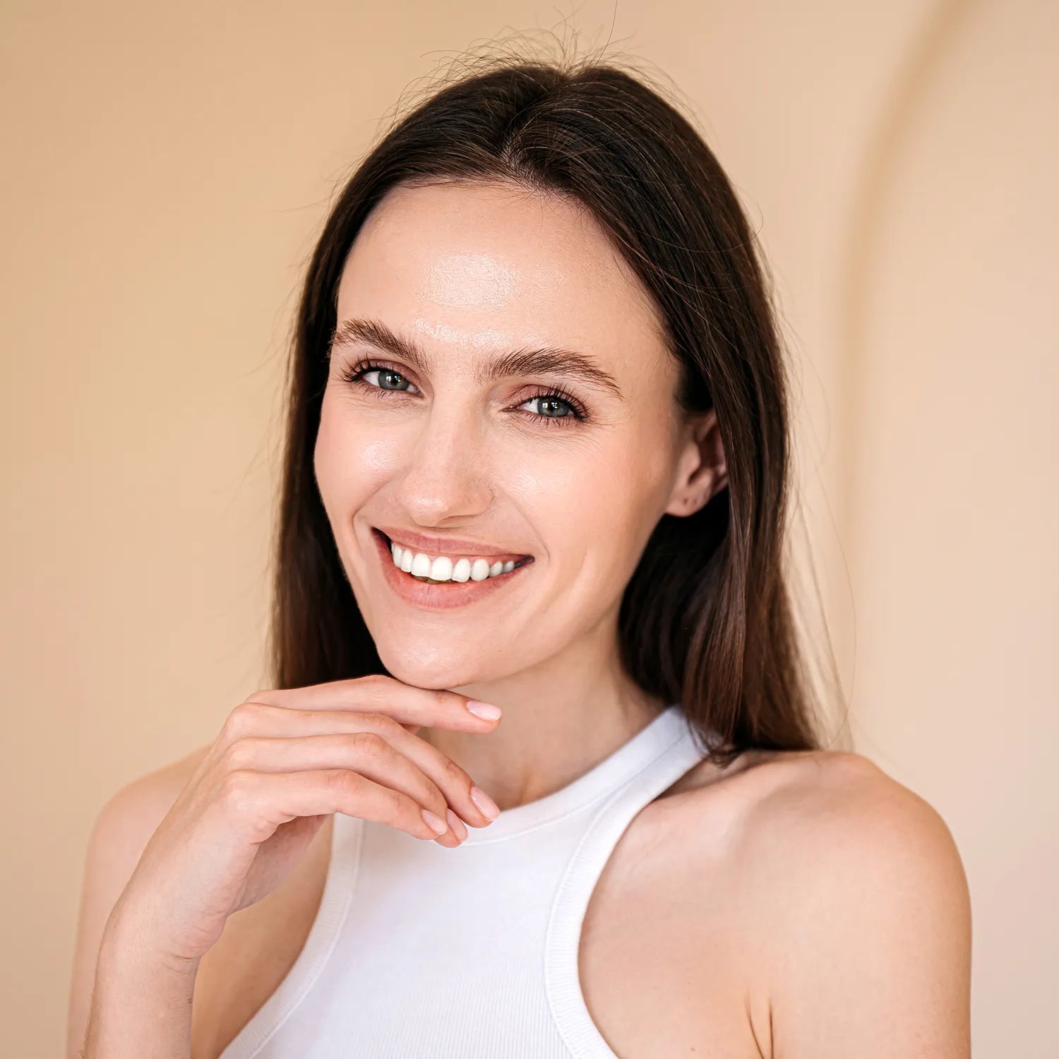 Portrait of a woman showcasing beautifully treated lashes and brows. Your beautiful lashes and brows deserve lasting care!